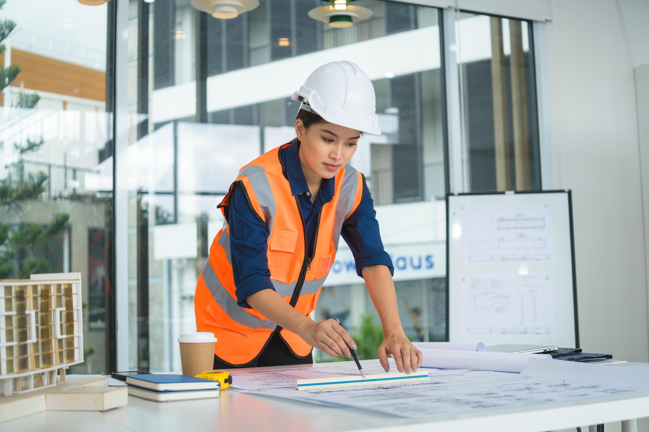 Architect working with architectural plans