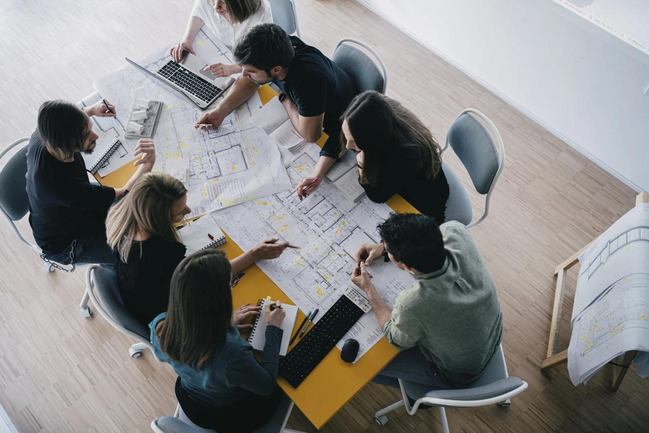 Architectural team working on building plans